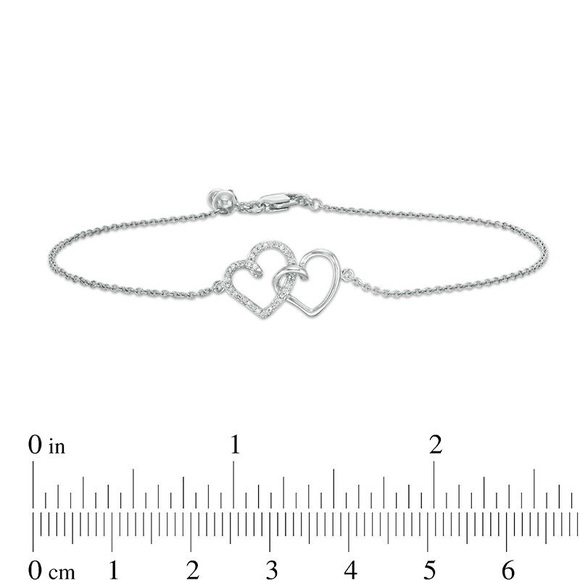 0.04 CT. T.W. Diamond Interlocking Hearts Bracelet in Sterling Silver - 6.75" - Picture 2 of 10